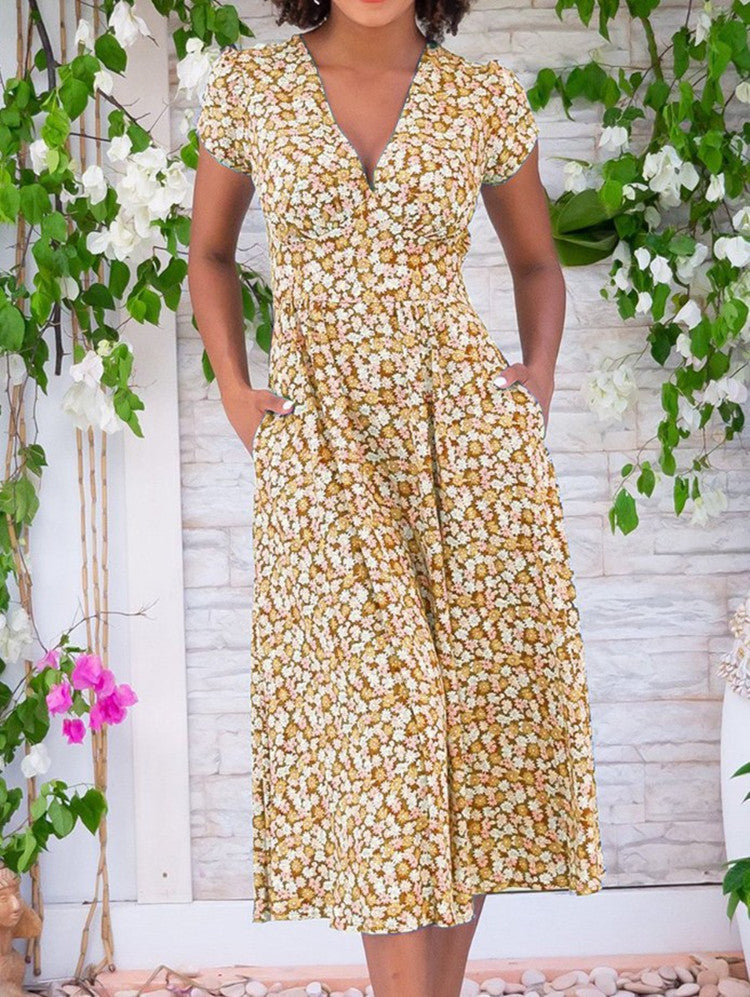 Casual yet elegant women's floral midi dress with a flattering V-neck & short sleeves for summer comfort.