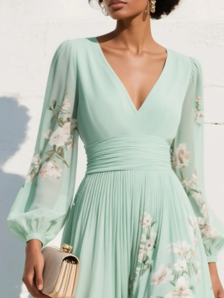 Beautiful floral midi dress for women, designed with a V-neck and chic sheer sleeves for a stylish look.