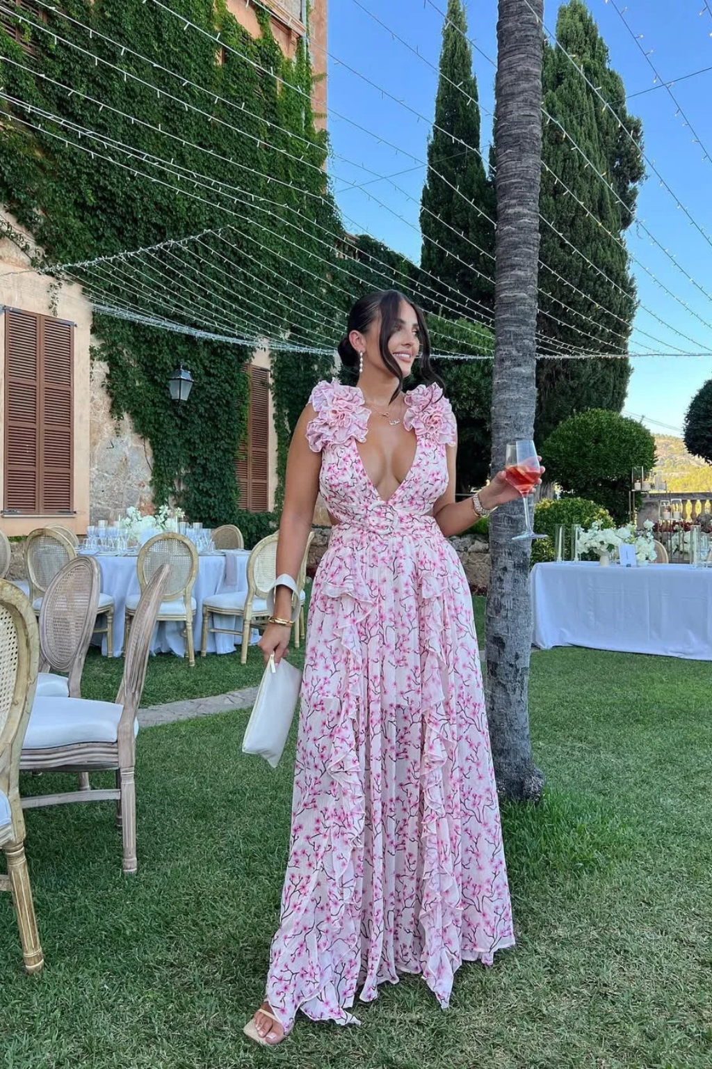 Women's elegant V-neck floral maxi dress with delicate ruffles, a perfect choice for wedding guest attire.
