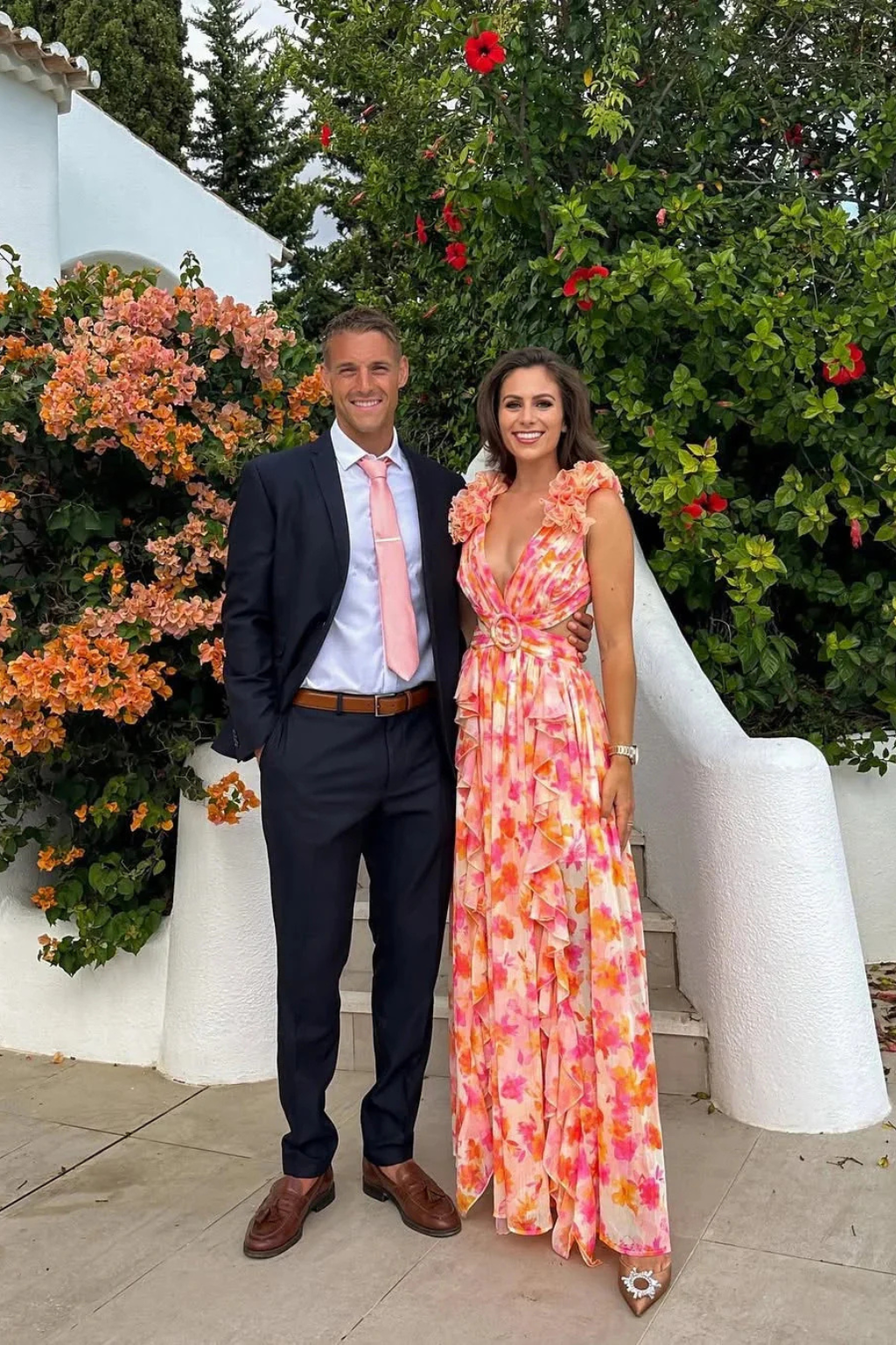 Gorgeous women's floral print V-neck maxi dress featuring playful ruffles, ideal for special occasions.