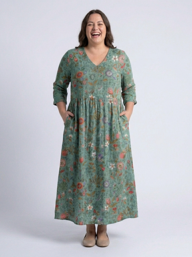 Vibrant floral print women's maxi dress with V-neck & three-quarter sleeves. Relaxed fit, elegant comfort.