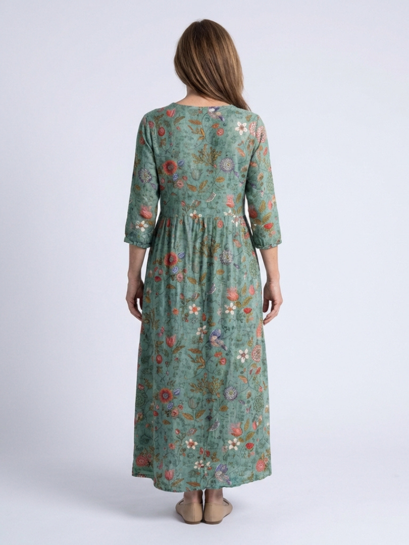 Relaxed fit women's floral print maxi dress. V-neck, 3/4 sleeves. Comfortable, chic for spring & summer fashion.
