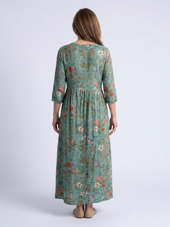 Relaxed fit women's floral print maxi dress. V-neck, 3/4 sleeves. Comfortable, chic for spring & summer fashion.