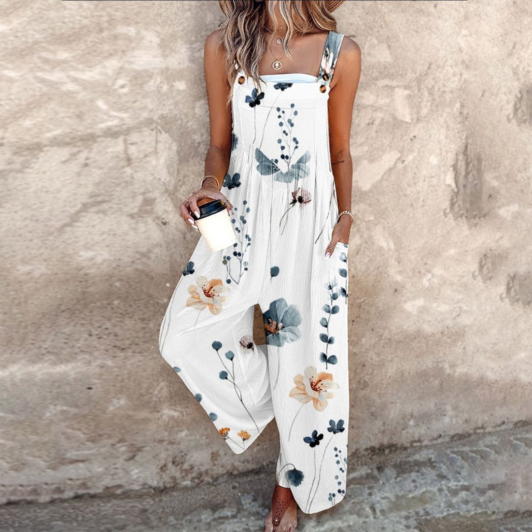 Elegant women's floral wide-leg jumpsuit with sleeveless design for effortless summer style & comfort.