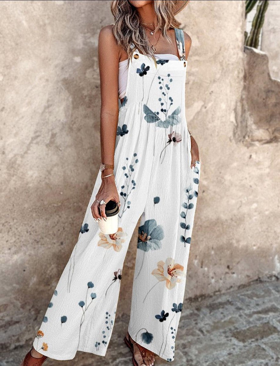 Comfortable women's sleeveless jumpsuit featuring a vibrant floral print and flowy wide-leg design.