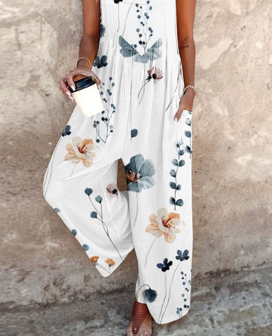 Fashionable women's floral sleeveless jumpsuit with a graceful wide-leg silhouette, ideal for any occasion.