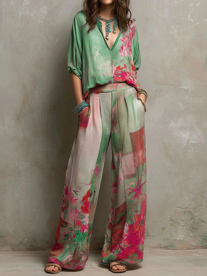 Chic women's floral print wide-leg two-piece set. Elegant summer outfit for versatile resort wear.