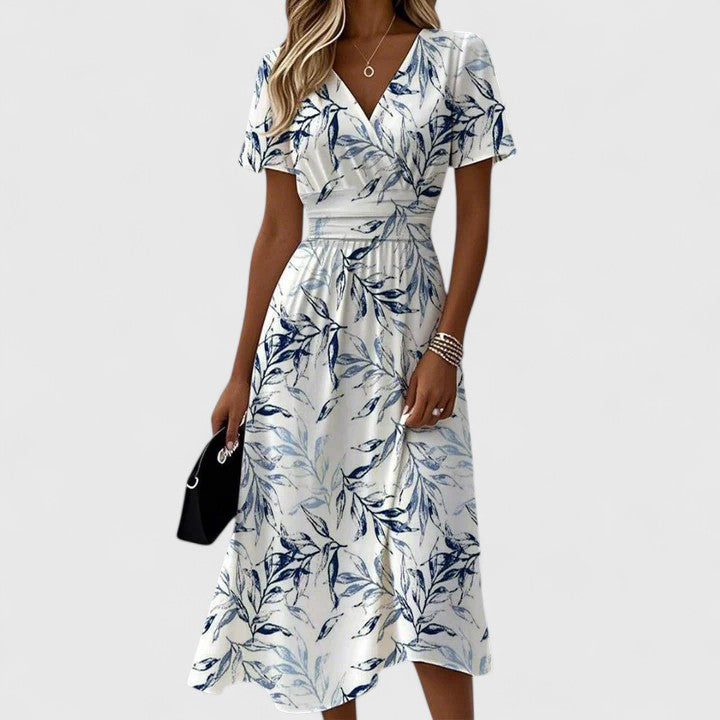 Elegant women's floral wrap maxi dress. Perfect for summer, featuring a flattering fit and versatile style.