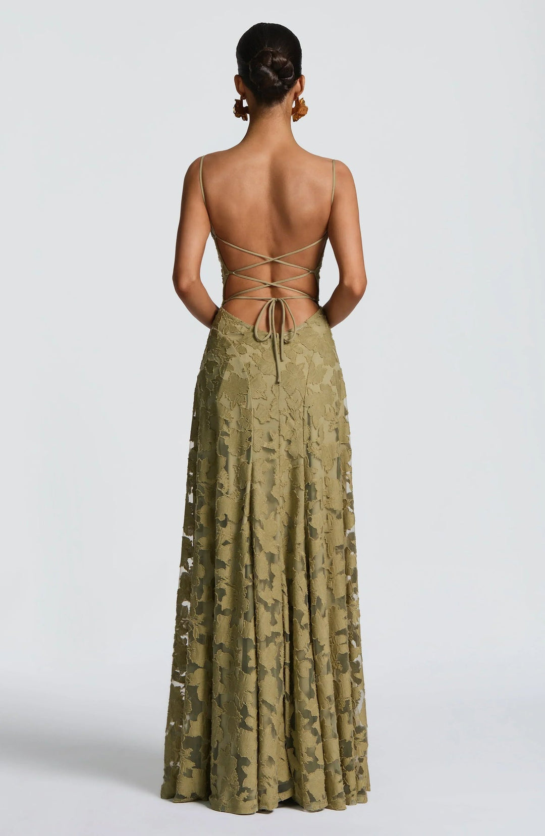 Flowing women's A-line maxi dress, elegant movement for special occasions & evening events.