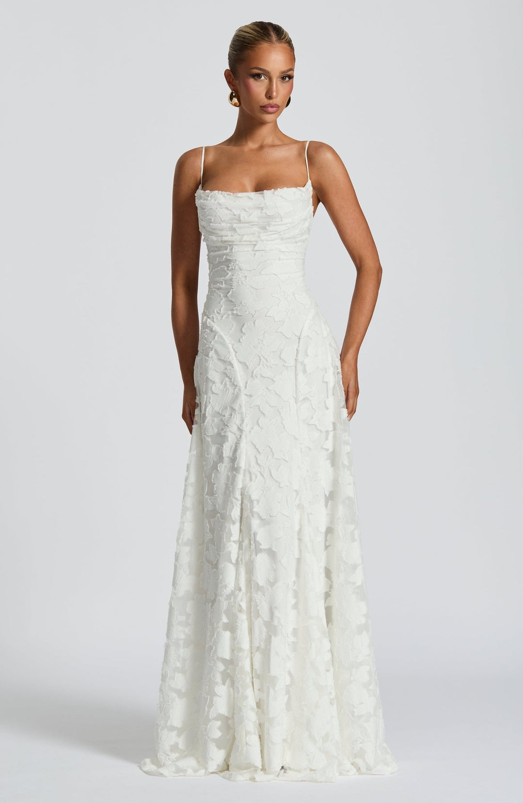 Spring fashion women's A-line maxi dress. Elegant flowing silhouette for sophisticated summer style.
