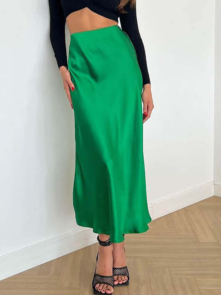 Stylish women's flowing A-line midi skirt, a versatile day-to-night apparel staple.