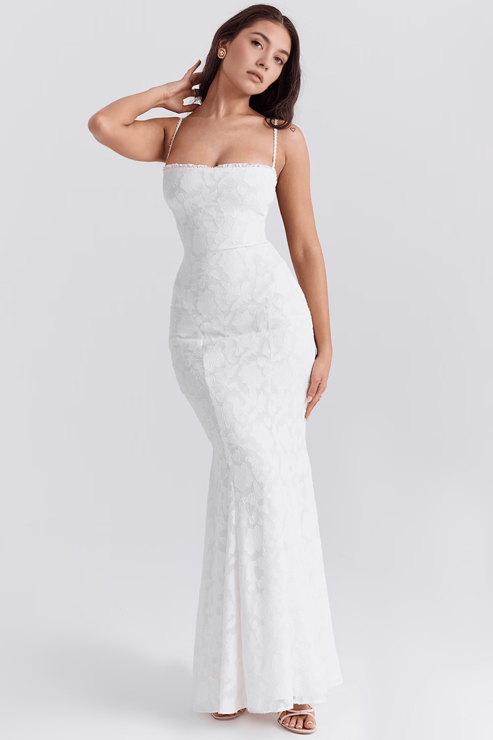 Feminine long summer dress for women, showcasing a flowing and sophisticated look.