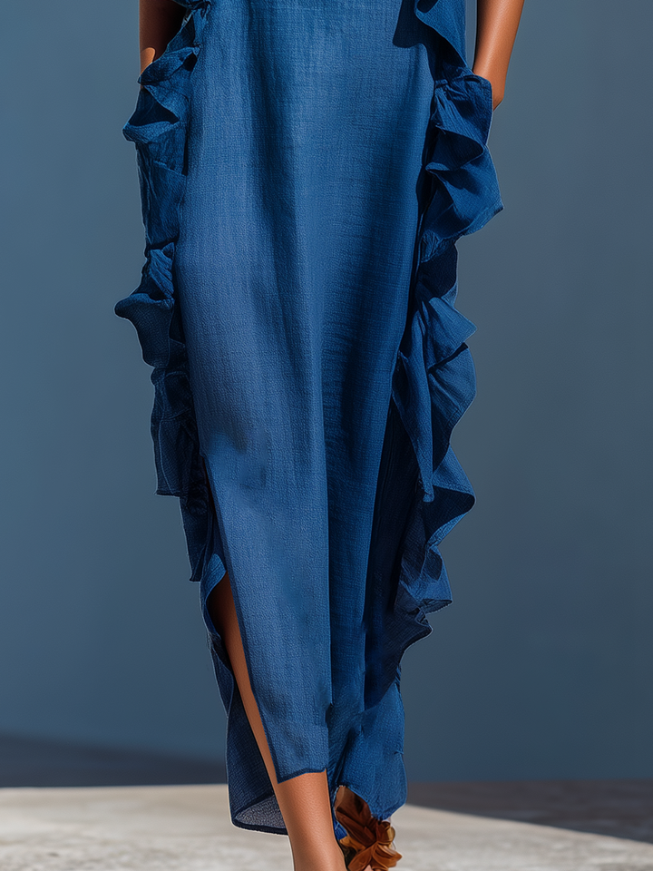 Effortless women's maxi dress with delicate straps and flowing design for elegant summer and vacation comfort.
