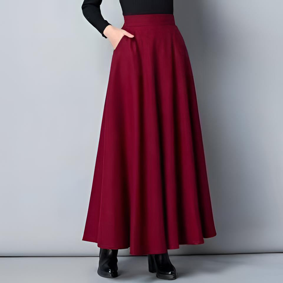 Elegant women's flowing maxi skirt with pockets, perfect for spring/summer comfort and style.