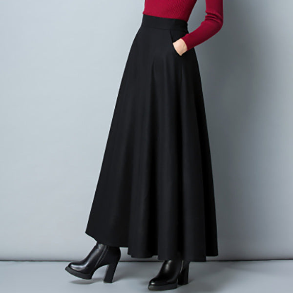 Stylish women's long flowing maxi skirt with discreet side pockets, offering an elegant & comfortable look.