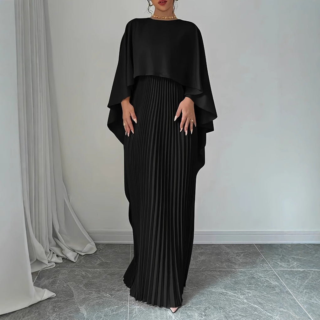 Women's luxurious pleated maxi dress with elegant batwing sleeves. Ideal long pullover for autumn evenings and formal wear.