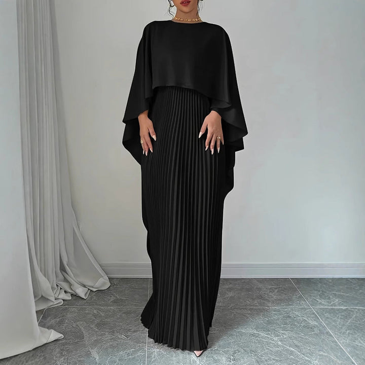 Women's luxurious pleated maxi dress with elegant batwing sleeves. Ideal long pullover for autumn evenings and formal wear.