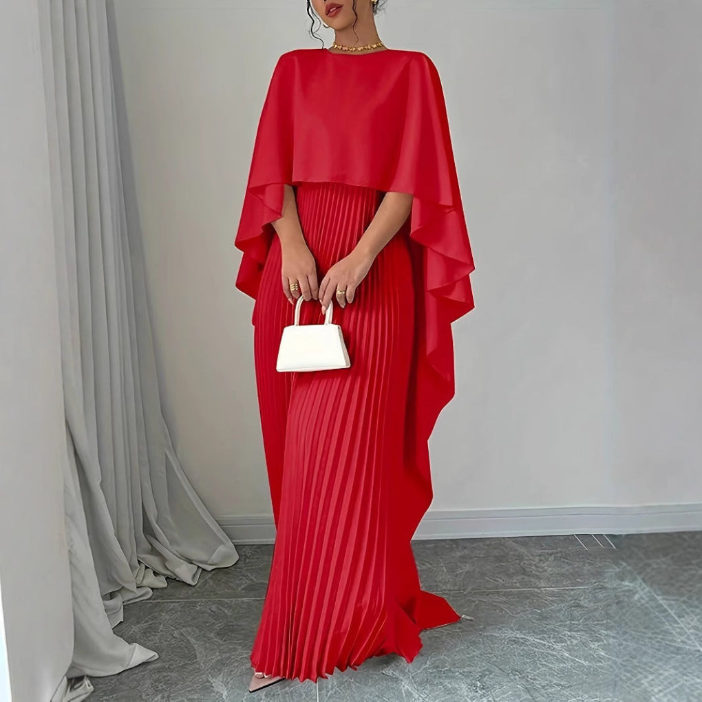 Chic women's flowing pleated maxi dress, featuring comfortable batwing sleeves. An elegant long dress for formal or evening wear.