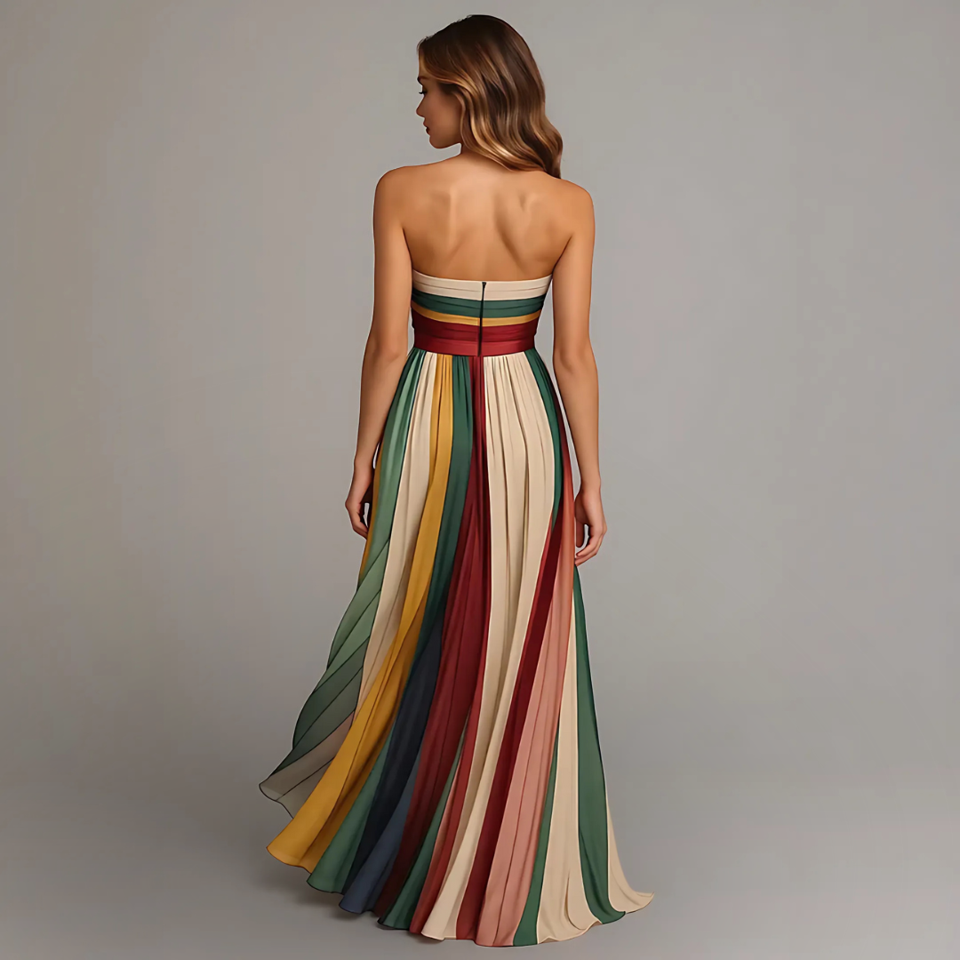 Stylish women's relaxed fit flowing maxi dress in a vibrant multicolour print. Comfortable and elegant long dress.
