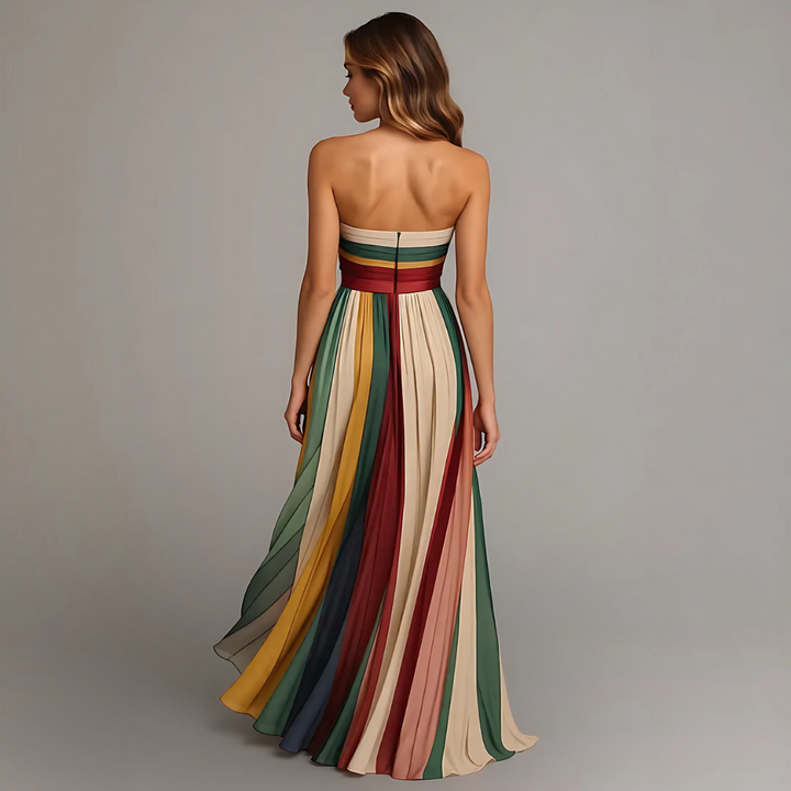 Stylish women's relaxed fit flowing maxi dress in a vibrant multicolour print. Comfortable and elegant long dress.