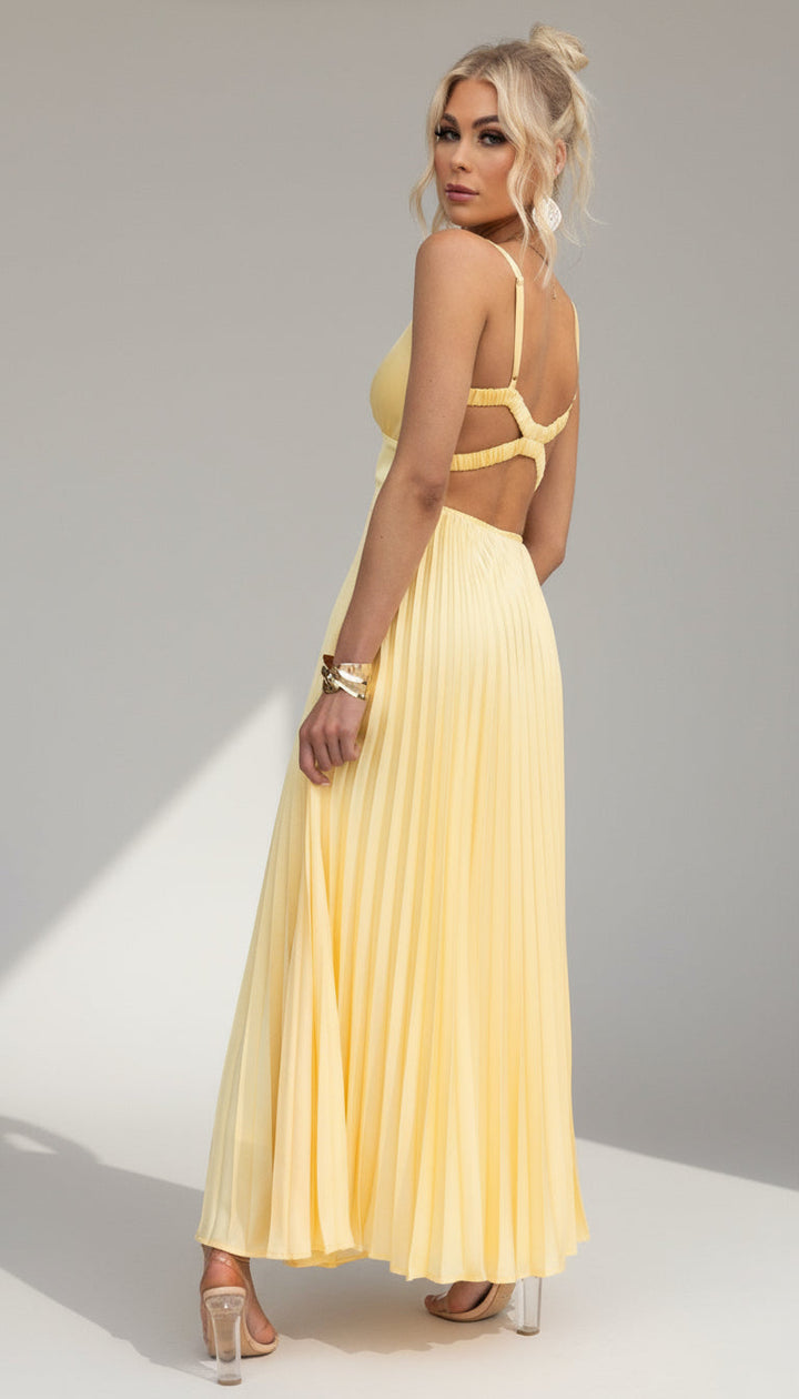 Feminine V-neck pleated maxi dress with a flowing silhouette. Elegant women's summer fashion, ideal for events.