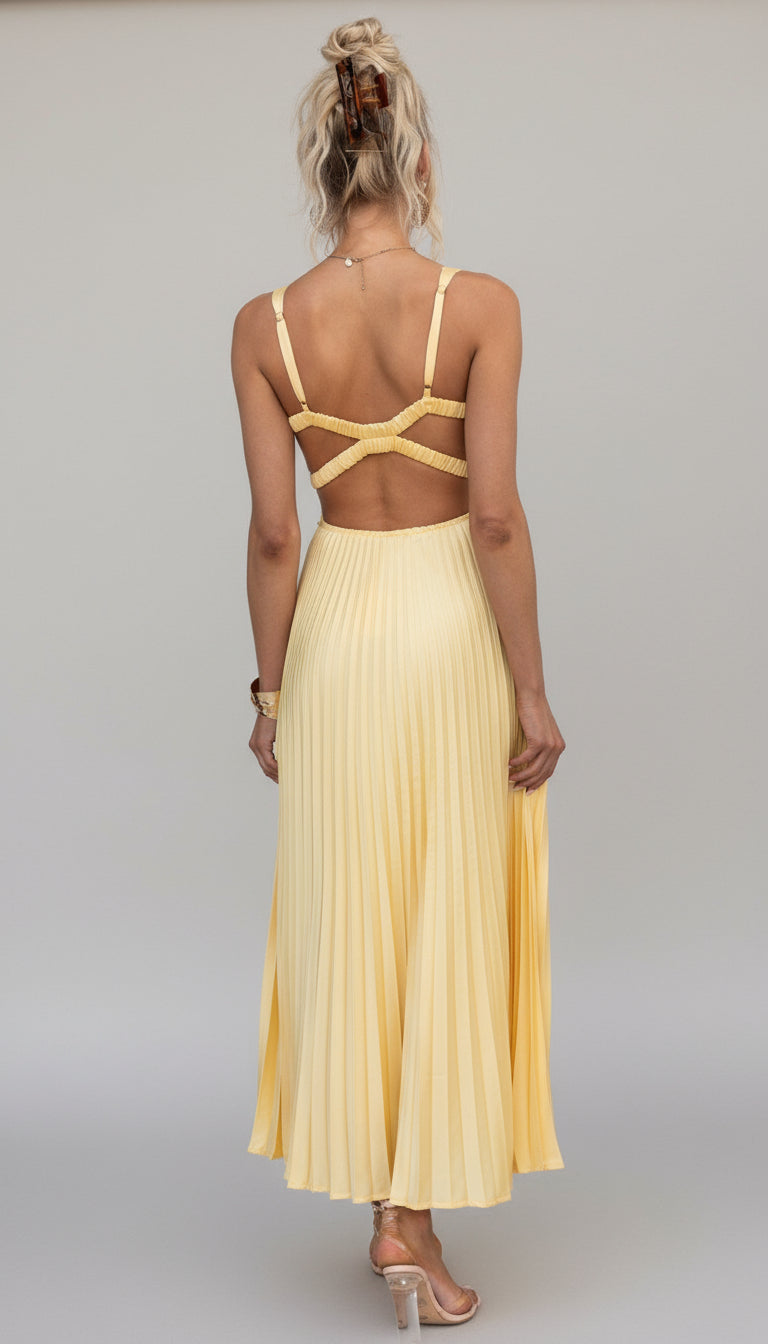 Stylish women's flowing pleated V-neck maxi dress. Elegant summer occasion wear, perfect for a chic feminine look.