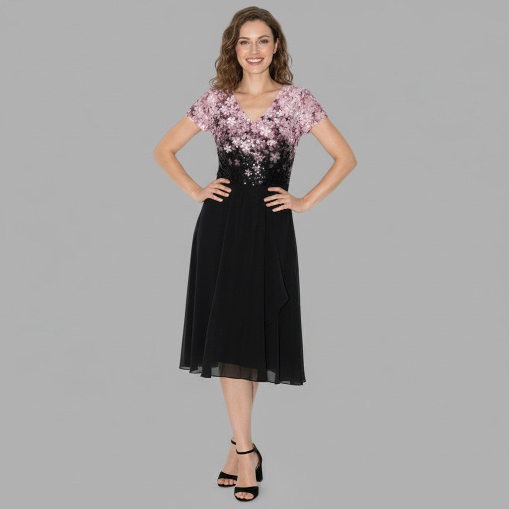Elegant women's flowy chiffon midi dress with short sleeves, perfect for summer.