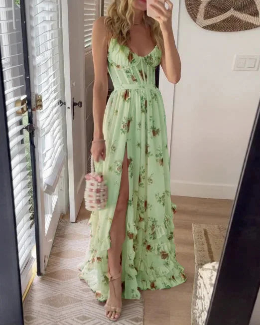 Romantic women's floral midi dress featuring a vibrant print, flattering V-neck, and a graceful flowy silhouette.