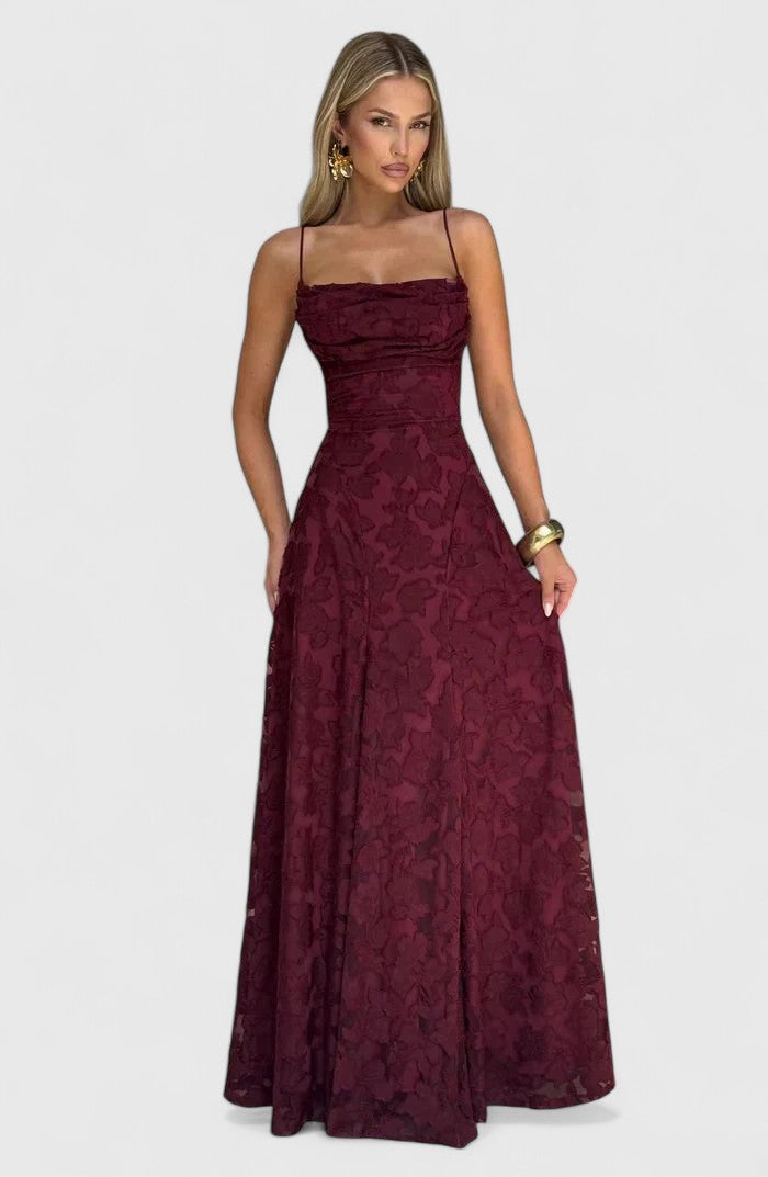 Women's romantic flowy maxi dress, a stunning open back design ideal for special occasion party wear.