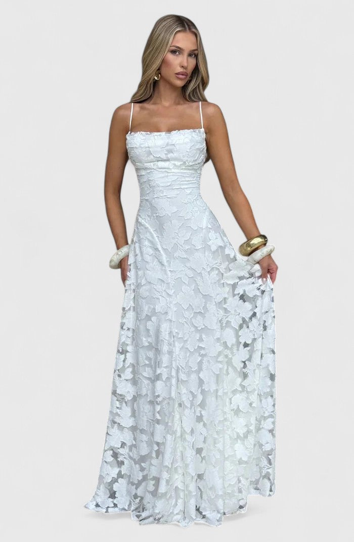 Stunning women's long evening gown featuring a dramatic open back, perfect for parties.