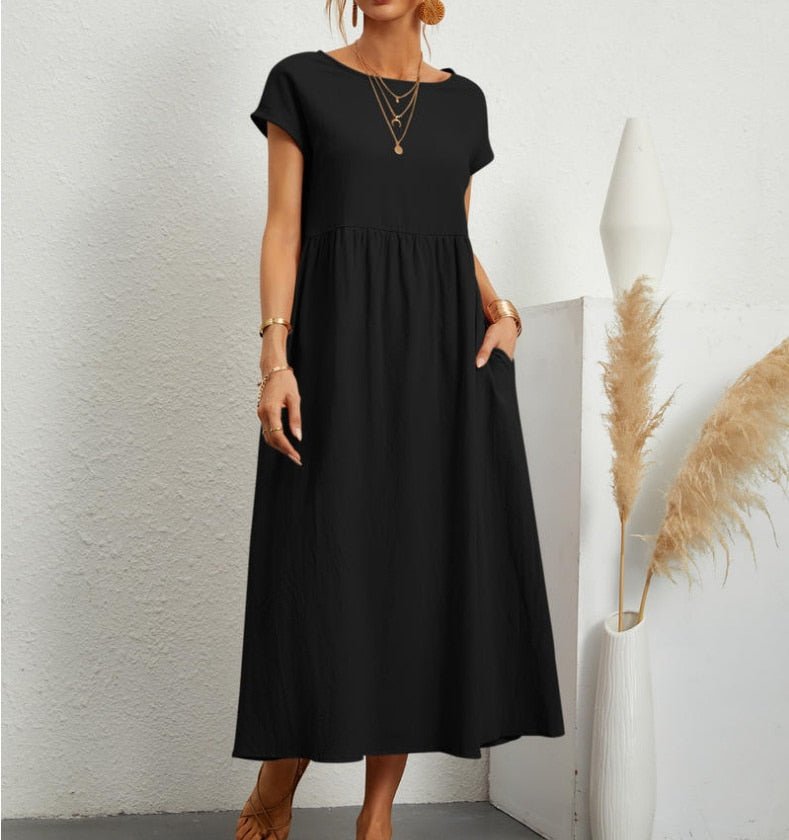 Elegant women's flowy maxi summer dress, perfect for comfortable wear on vacation or everyday outings.