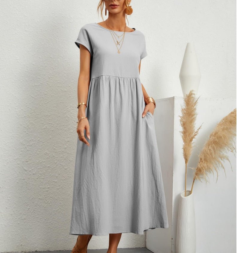 Versatile women's flowy maxi dress, ideal for casual summer days, beachwear, or elegant vacation evenings.