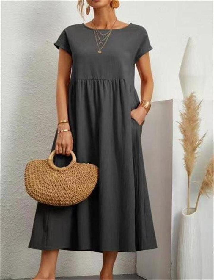 Lightweight women's flowy maxi sundress, comfortable and stylish for summer beach outings or casual wear.