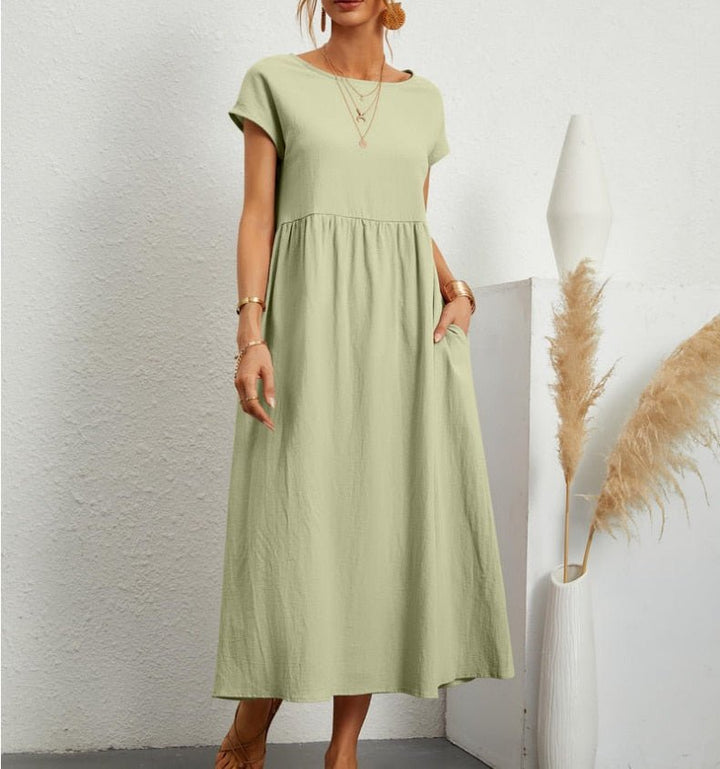 Women's elegant flowy maxi summer dress, comfortable and versatile for beach, vacation, or everyday wear.
