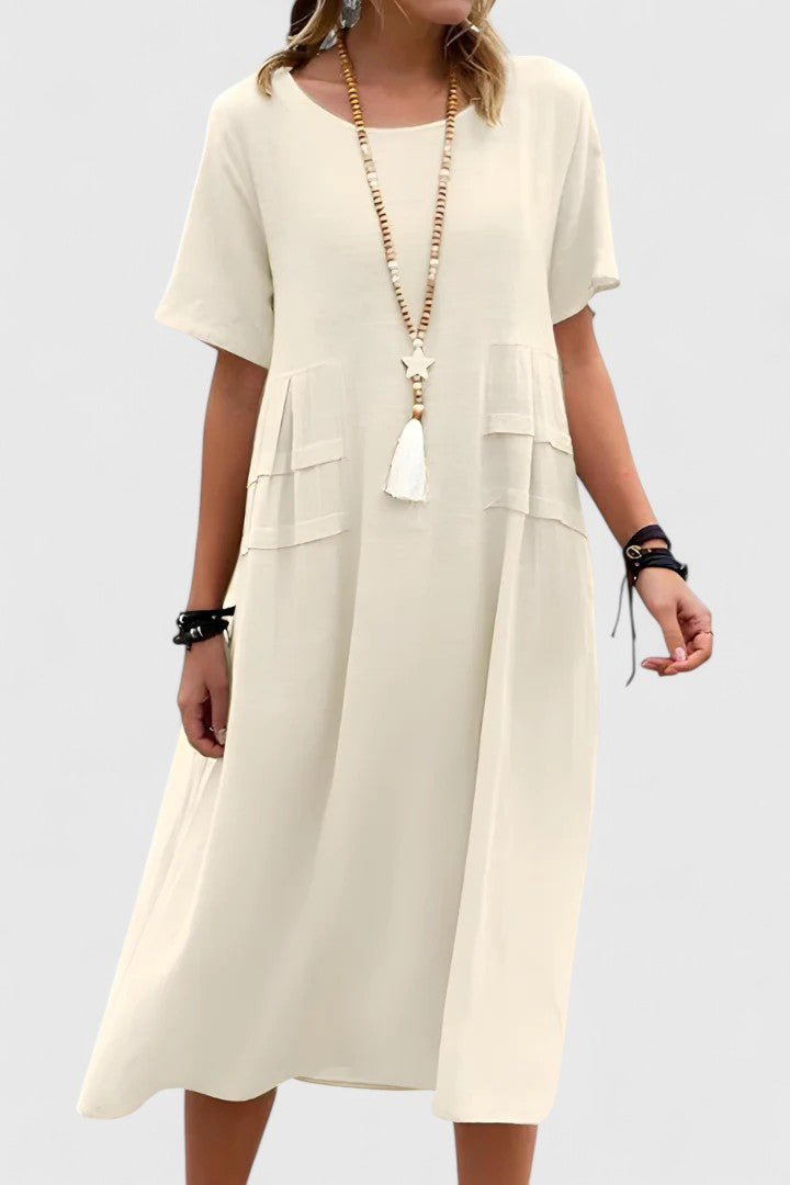 Comfortable & versatile women's midi dress with a flattering flowy design, ideal for casual or evening wear.