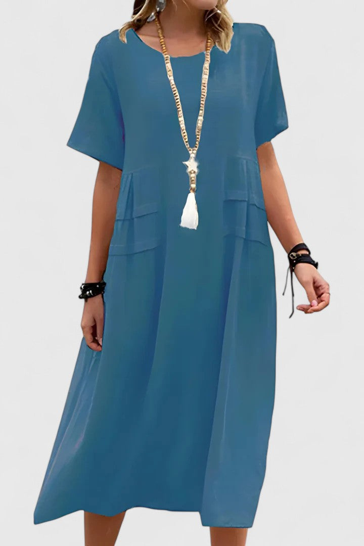 Chic women's flowy midi dress, an elegant choice for parties, summer events, or any special occasion.