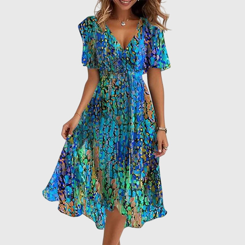 Elegant women's flowy midi dress with V-neck & flutter sleeves, perfect for summer parties and chic events.