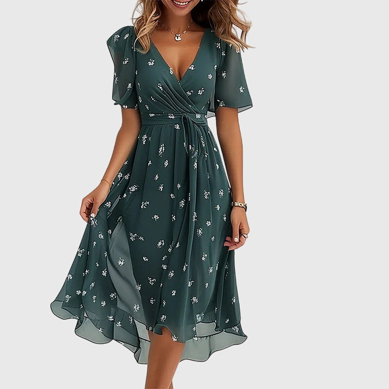 Stylish women's elegant flowy midi dress with V-neck and flutter sleeves, offering a flattering and chic look.