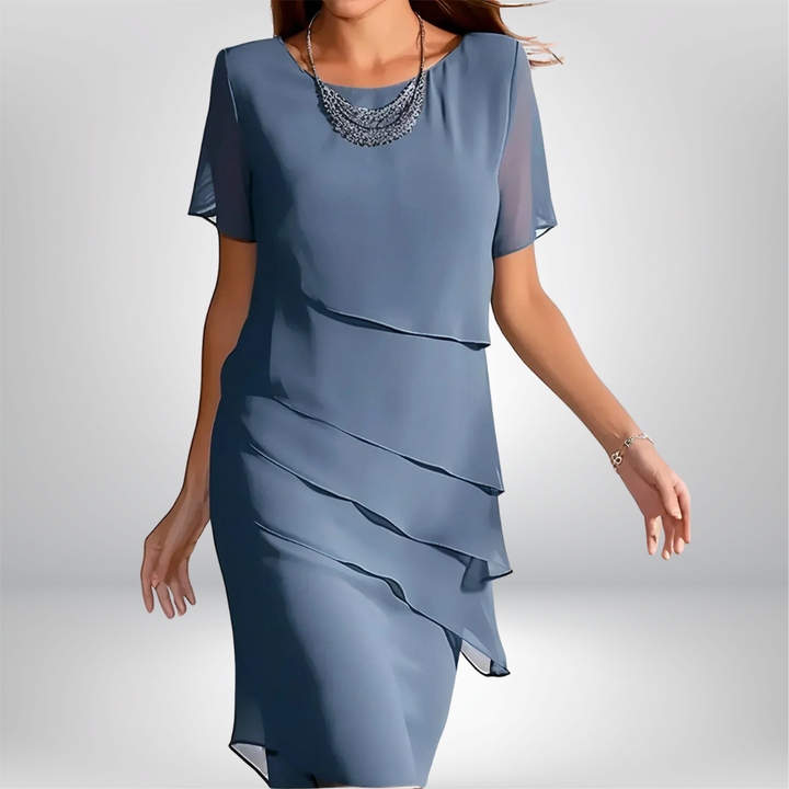 Elegant women's flowy short sleeve dress, perfect for any occasion. Chic style & flattering silhouette.