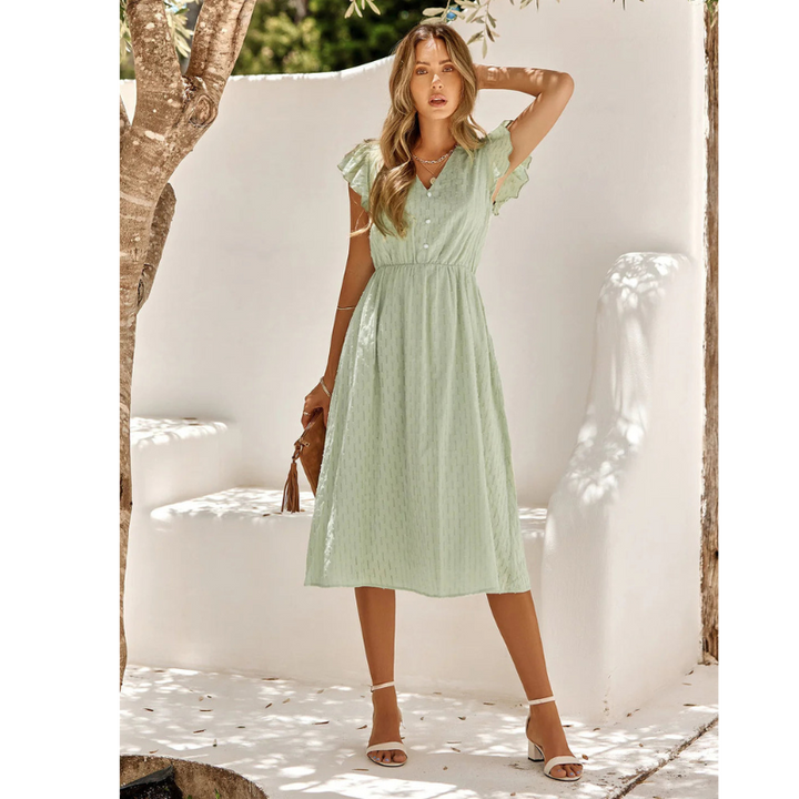 Elegant women's flutter sleeve midi dress in a flowy A-line style, perfect for spring and summer fashion.