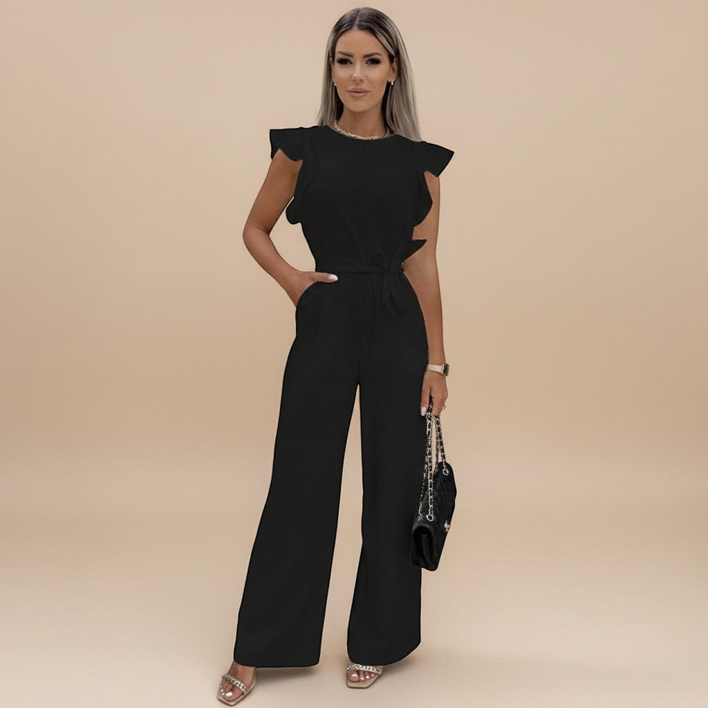 Modern women's elegant jumpsuit: flutter sleeves, wide leg pants, and a sophisticated self-tie waist.