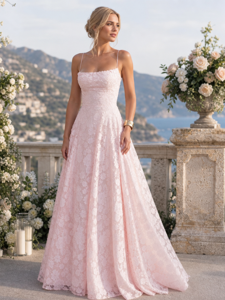Elegant women's full lace spaghetti strap maxi dress. Ideal for evening, party, or summer fashion.