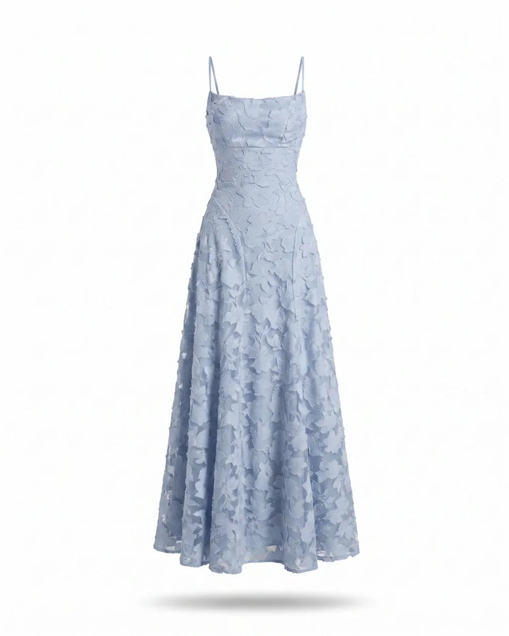 Flowy women's full lace maxi dress with delicate spaghetti straps, ideal for elegant summer party wear.