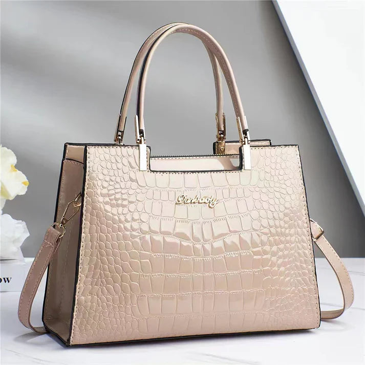 Elegant women's glossy handbag, perfect for stylish everyday use & formal events. Sophisticated modern design purse.