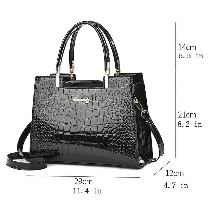 Versatile women's everyday handbag with a chic glossy finish. A stylish accessory for day or evening.