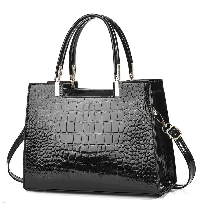 Chic women's evening bag with a luxurious glossy finish. Ideal for formal events and elegant occasions.