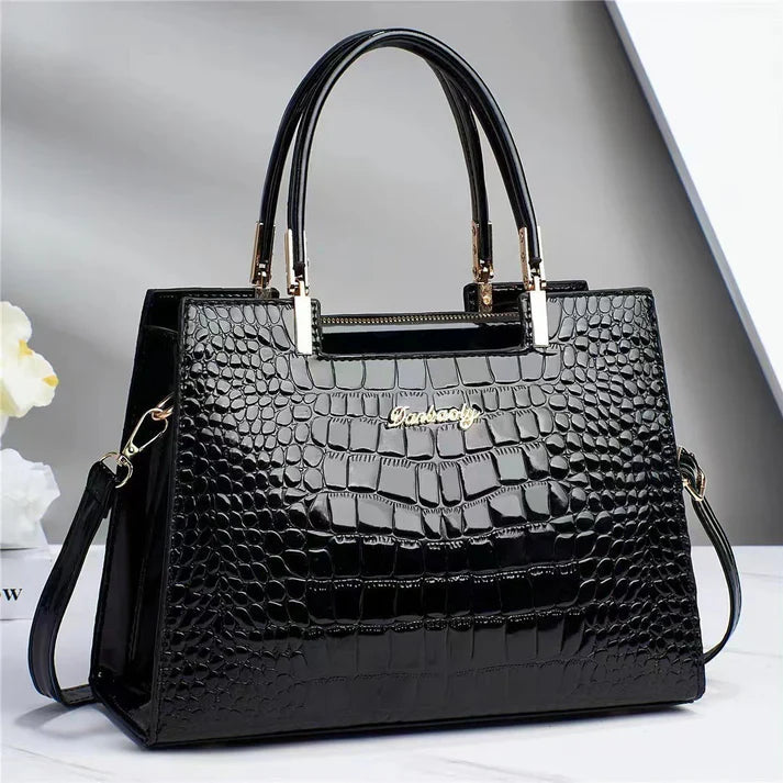 Sophisticated women's glossy accessory bag. This elegant purse complements any outfit for stylish appeal.