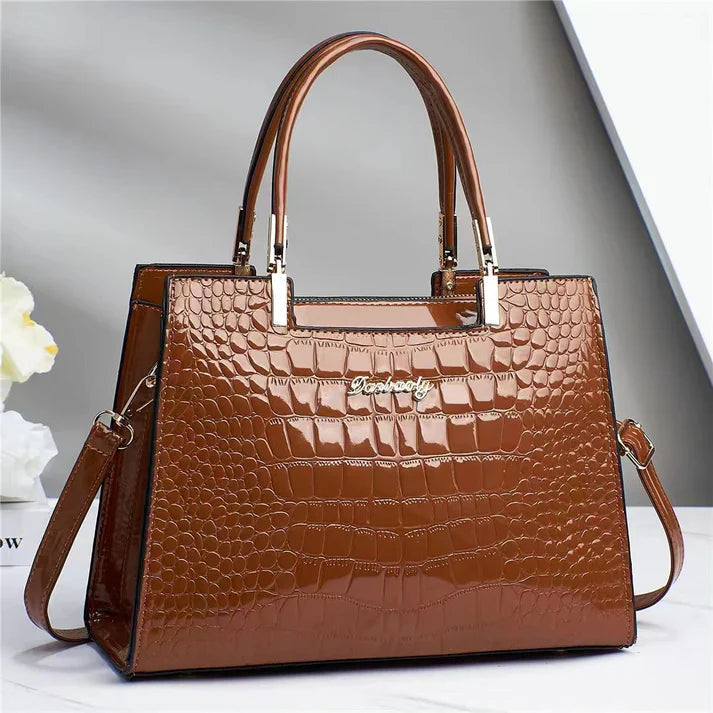 Luxurious glossy women's handbag. A stylish & elegant accessory, perfect as an everyday bag or for formal events.