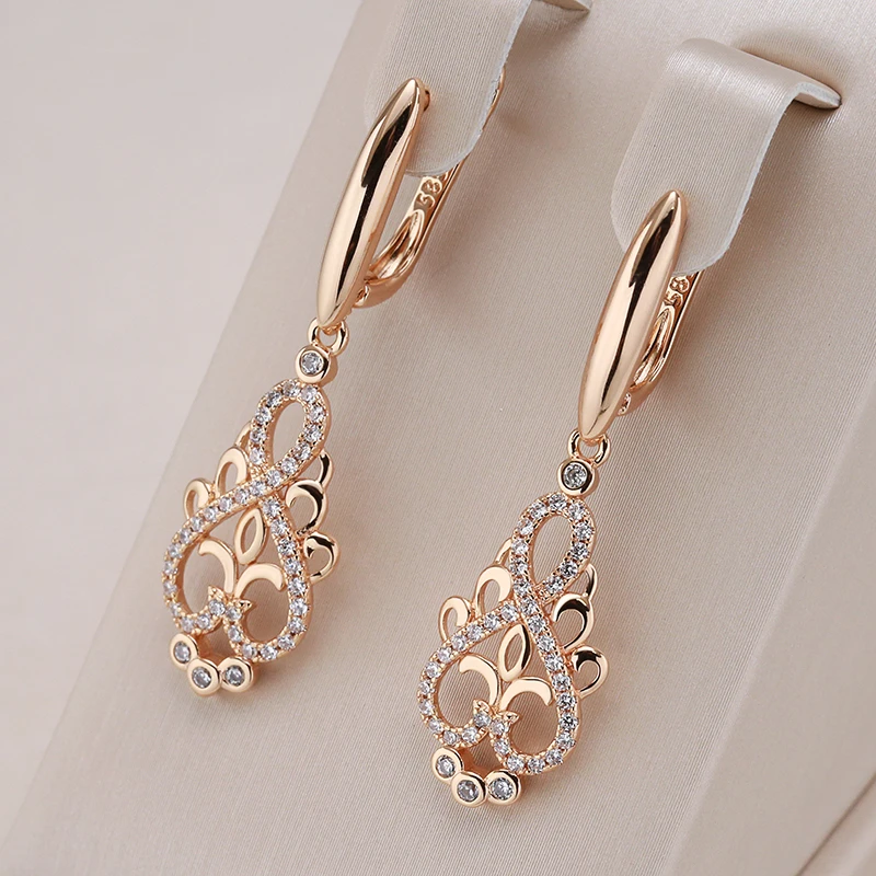 Elegant women's gold fairy dangle earrings, lightweight and whimsical. Perfect women's jewelry gift.