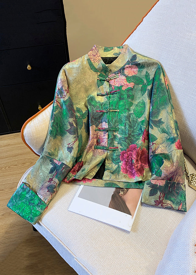 Elegant women's green silk blend coat with traditional Chinese button closure and intricate print. Perfect autumn fashion outerwear.